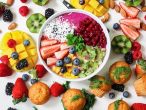 A variety of protein-rich foods including eggs, chicken breast, salmon, lentils, and Greek yogurt.-Teluguways.com