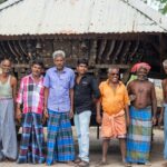 Young man starting a small business in Indian village with government scheme support